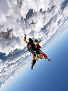Preview wallpaper jump, clouds, sky, plane, parachutists