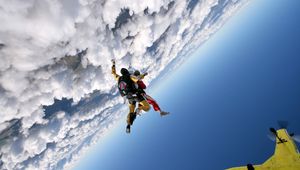 Preview wallpaper jump, clouds, sky, plane, parachutists