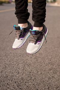 Preview wallpaper jump, legs, sneakers, shoes, asphalt