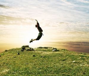 Preview wallpaper jump, people, field, grass, sky, nature