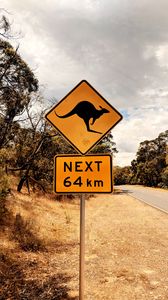 Preview wallpaper kangaroo, sign, inscription, road