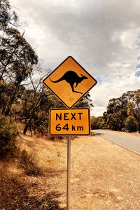 Preview wallpaper kangaroo, sign, inscription, road