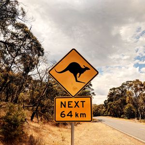 Preview wallpaper kangaroo, sign, inscription, road