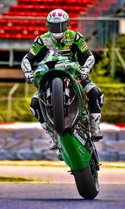Preview wallpaper kawasaki, motorcycle, green, motorcyclist, trick