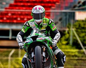 Preview wallpaper kawasaki, motorcycle, green, motorcyclist, trick