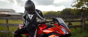 Preview wallpaper kawasaki, motorcycle, motorcyclist, helmet