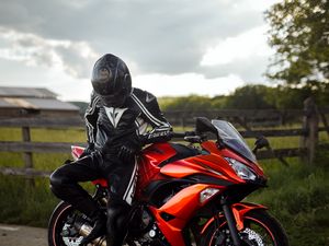 Preview wallpaper kawasaki, motorcycle, motorcyclist, helmet