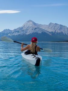 Preview wallpaper kayak, boat, girl, oars, water, mountains