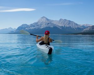 Preview wallpaper kayak, boat, girl, oars, water, mountains