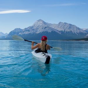 Preview wallpaper kayak, boat, girl, oars, water, mountains