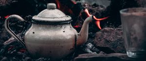 Preview wallpaper kettle, bonfire, logs, fire, camping