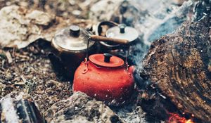 Preview wallpaper kettle, fire, stones