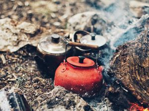 Preview wallpaper kettle, fire, stones