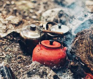 Preview wallpaper kettle, fire, stones