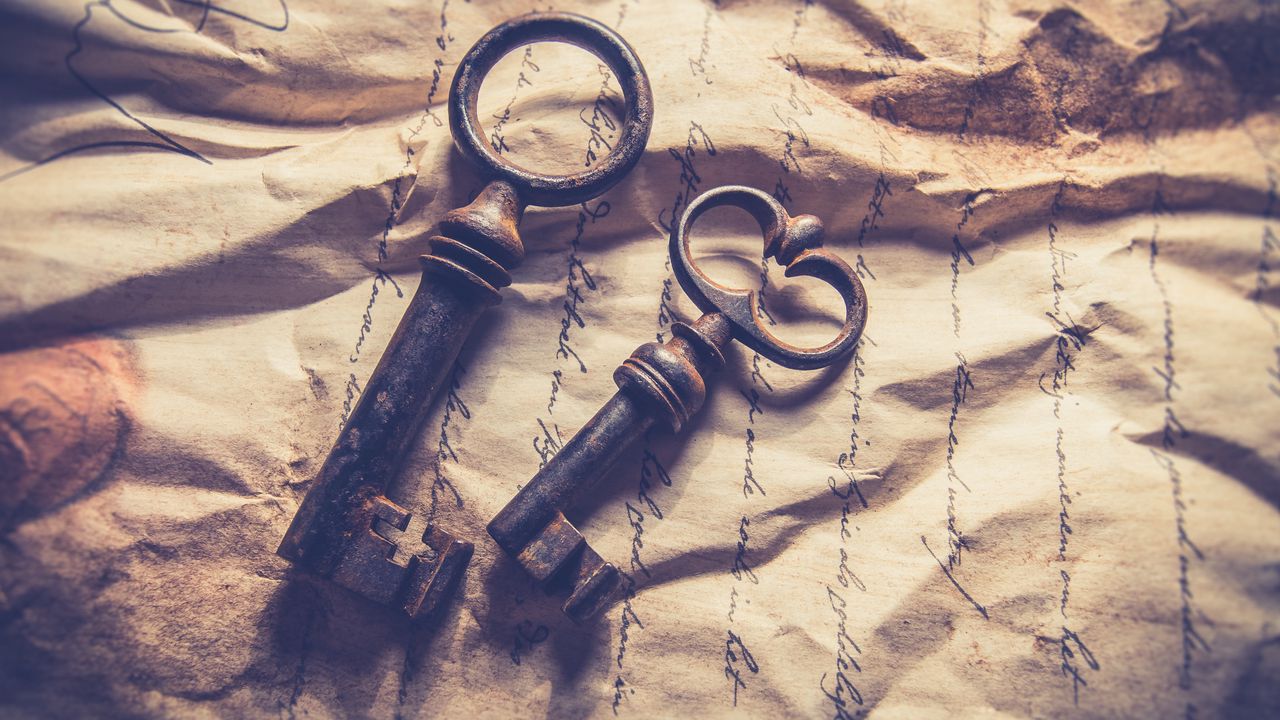 Wallpaper key, paper, rust, folds, retro