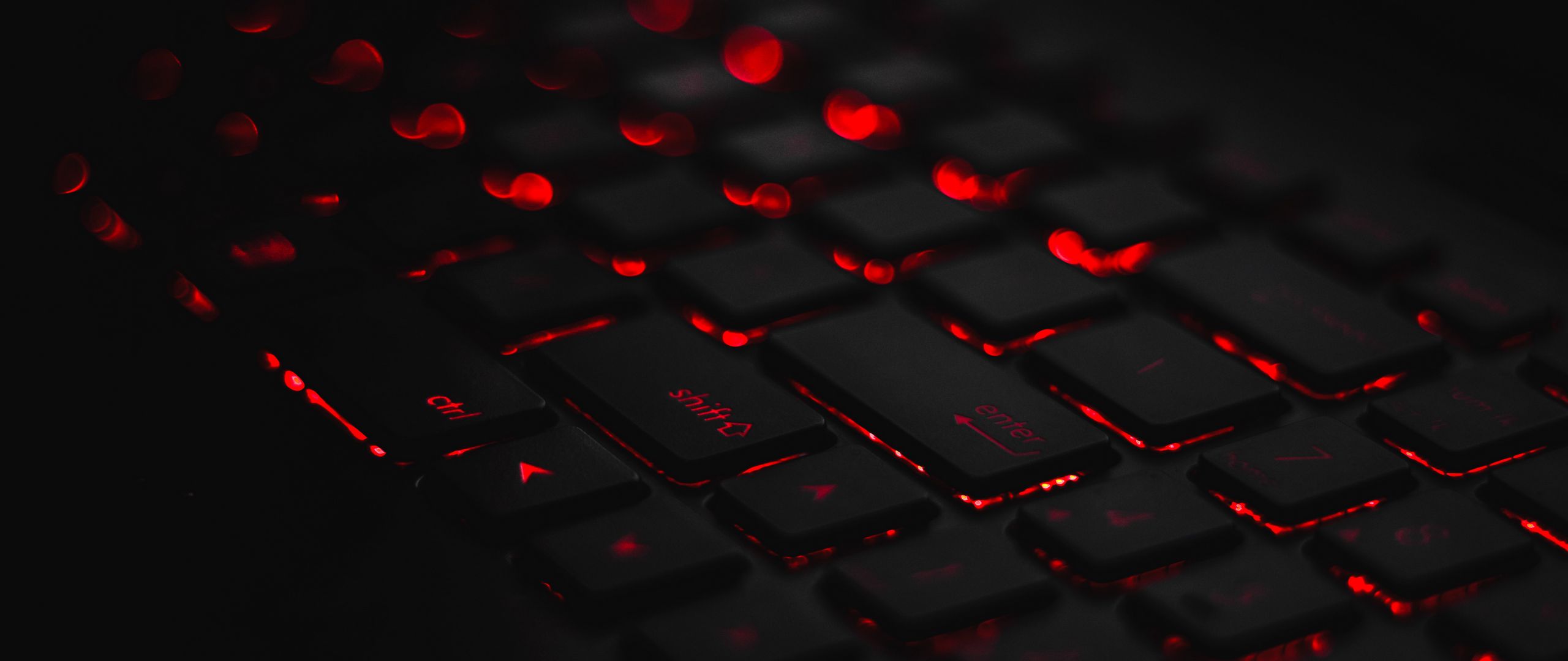 2560x1080 Wallpaper keyboard, backlight, red, glare, bokeh