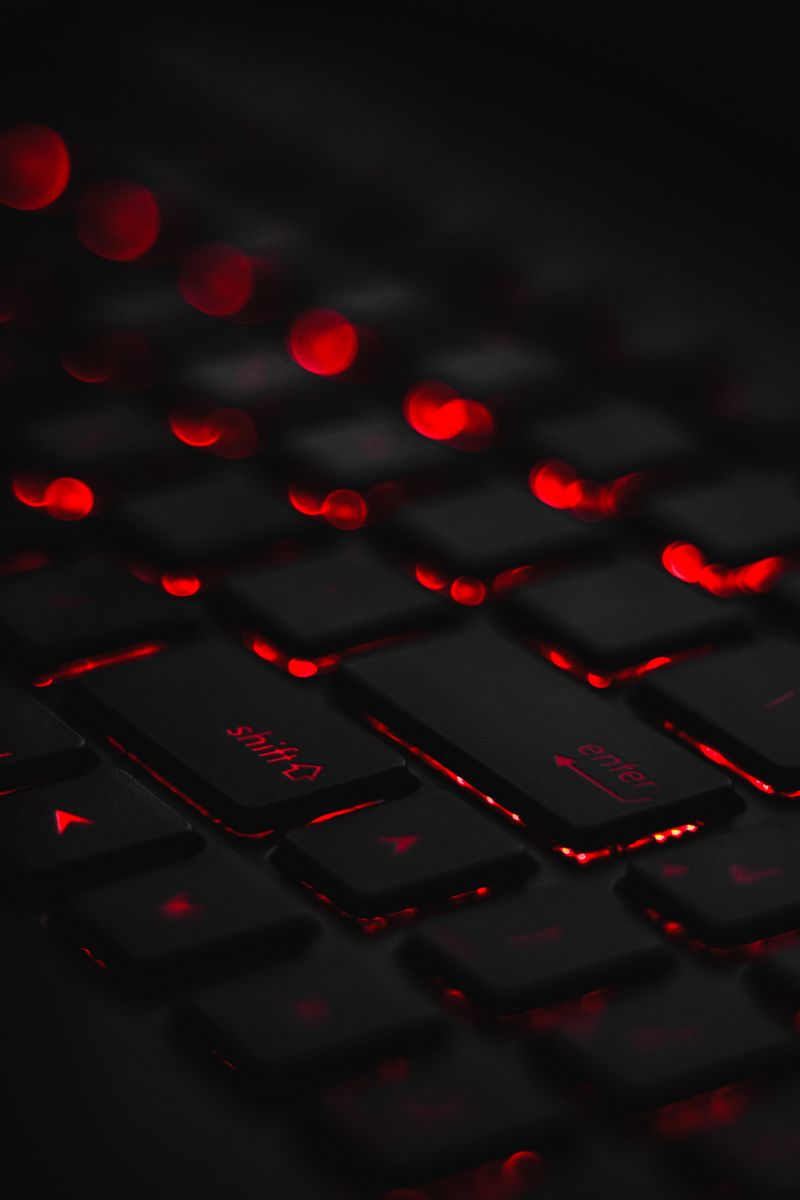800x1200 Wallpaper keyboard, backlight, red, glare, bokeh