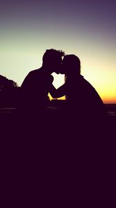 Preview wallpaper kiss, silhouette, couple, love, sunset
