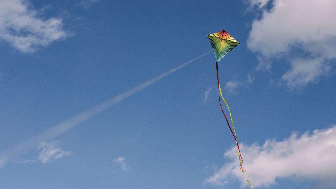 Download wallpaper 1366x768 kite, sky, clouds tablet, laptop hd background