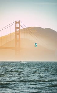 Preview wallpaper kitesurfing, parachute, water, bridge, fog