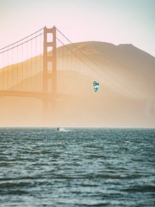 Preview wallpaper kitesurfing, parachute, water, bridge, fog