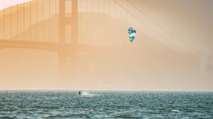 Preview wallpaper kitesurfing, parachute, water, bridge, fog