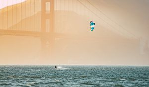 Preview wallpaper kitesurfing, parachute, water, bridge, fog