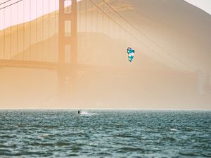 Preview wallpaper kitesurfing, parachute, water, bridge, fog