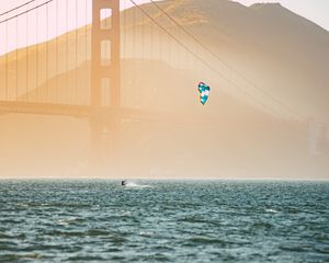 Preview wallpaper kitesurfing, parachute, water, bridge, fog