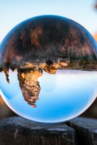 Preview wallpaper konigstein, bowl, glass, tree stump, reflection, mountains