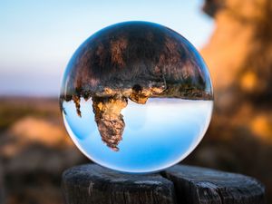 Preview wallpaper konigstein, bowl, glass, tree stump, reflection, mountains