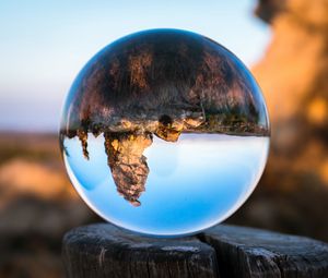 Preview wallpaper konigstein, bowl, glass, tree stump, reflection, mountains