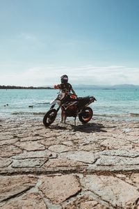 Preview wallpaper ktm, motorcycle, girl, helmet, coast