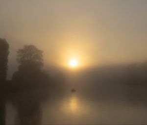 Preview wallpaper lake, boat, fog, sun, morning, fishing