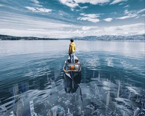 Preview wallpaper lake, boat, silhouette, city, illusion