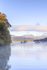 Preview wallpaper lake, boats, clouds, landscape, nature