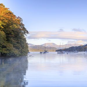 Preview wallpaper lake, boats, clouds, landscape, nature