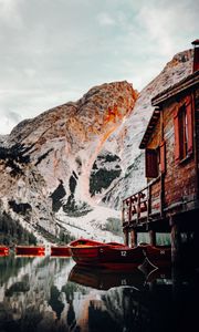 Preview wallpaper lake, boats, pier, mountain, water