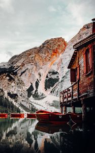 Preview wallpaper lake, boats, pier, mountain, water