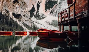 Preview wallpaper lake, boats, pier, mountain, water