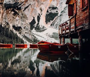 Preview wallpaper lake, boats, pier, mountain, water