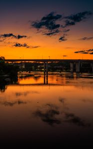 Preview wallpaper lake, bridge, trees, clouds, sky, sunset, dark