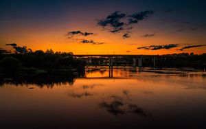 Preview wallpaper lake, bridge, trees, clouds, sky, sunset, dark