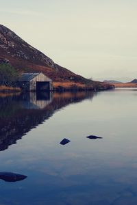 Preview wallpaper lake, building, mountains, reflection