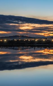 Preview wallpaper lake, buildings, lights, trees, reflection, evening