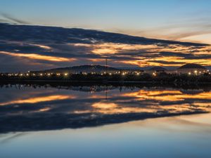 Preview wallpaper lake, buildings, lights, trees, reflection, evening