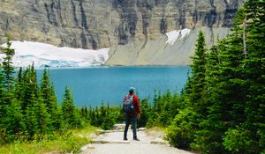 Preview wallpaper lake, cliff, man, nature, travel