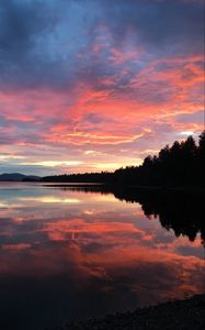 Preview wallpaper lake, clouds, forest, reflection, evening, sunset