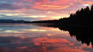 Preview wallpaper lake, clouds, forest, reflection, evening, sunset