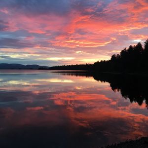 Preview wallpaper lake, clouds, forest, reflection, evening, sunset